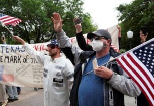الصحة العالمية تدعو المتظاهرين بأمريكا لارتداء الكمامات