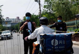 بكين تسجل مئات الاصابات الجديدة بكورونا