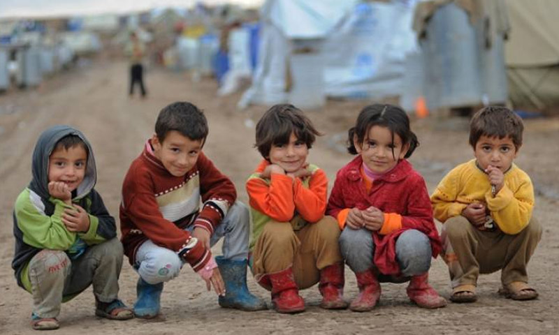 أطفال سوريين بأحد مخيمات اللجوء-أرشيفية
