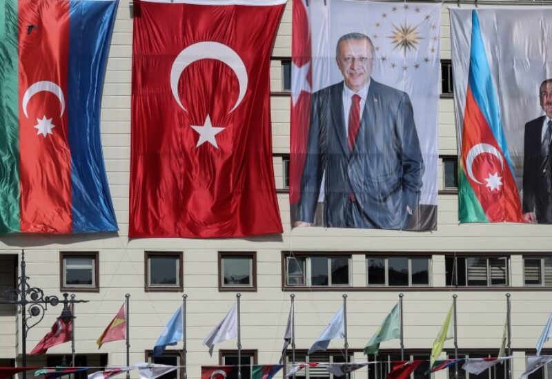 صورة أردوغان بجانب نظيره الأذري