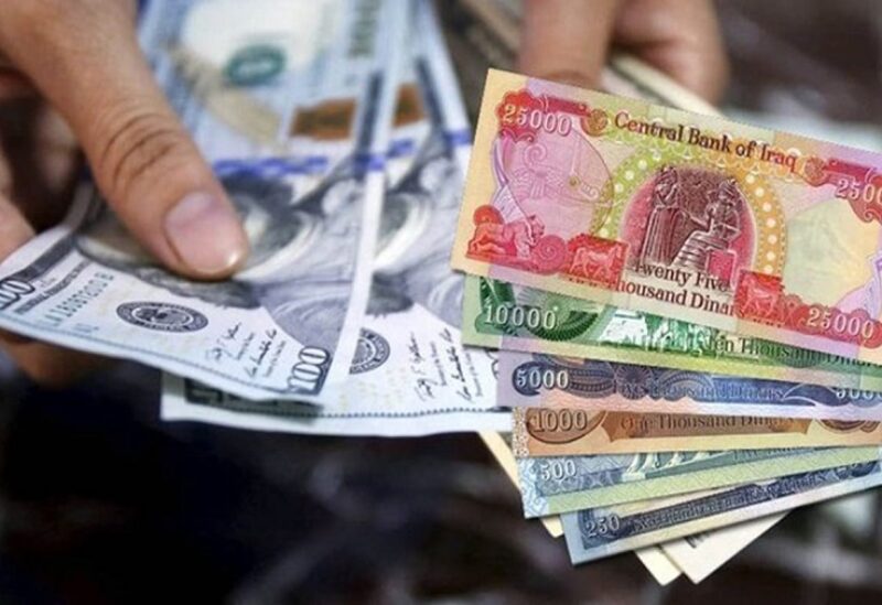 العراق يخفض سعر الدينار أمام الدولار