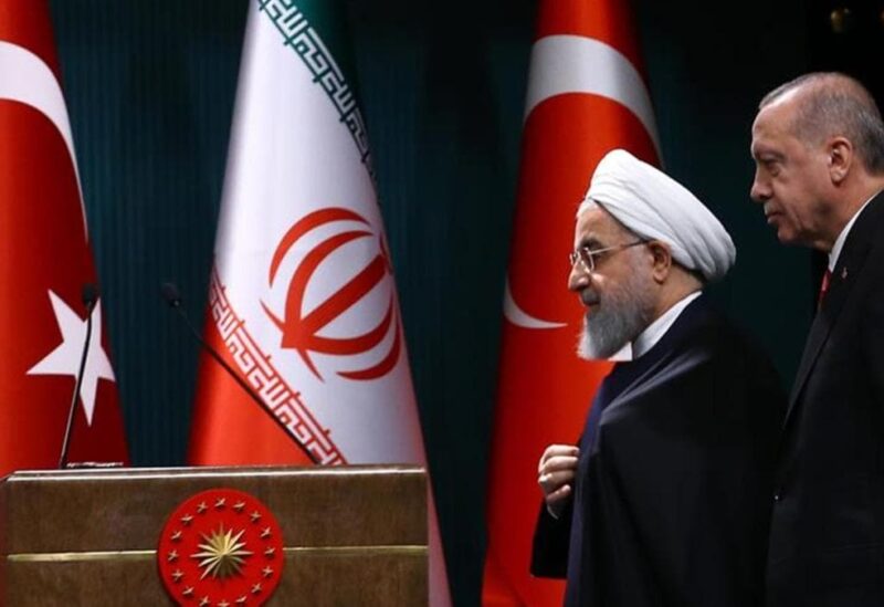 الرئيس التركي رجب أردوغان ونظيره الإيراني حسن روحاني
