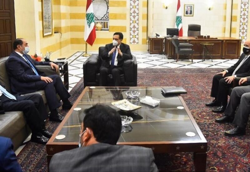 حسان دياب والسفير زكي