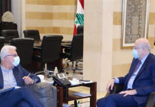رئيس الحكومة نجيب ميقاتي ووزير الاتصالات جوني القرم