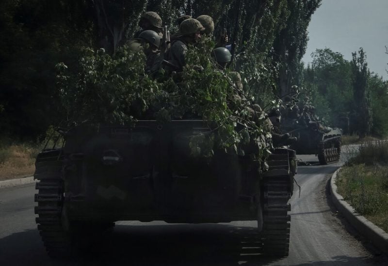 جنود أوكرانيون في دونيتسك - رويترز