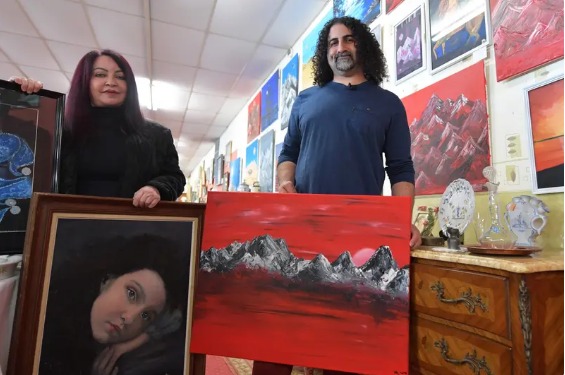 عمر بن لادن وزوجته 