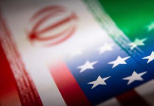العلم الأمريكي والإيراني