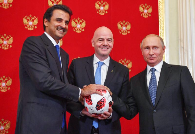 الرئيس الروسي وأمير قطر ورئيس الاتحاد الدولي لكرة القدم "فيفا"