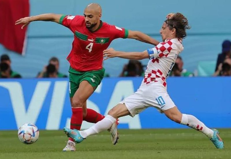 سفيان أمرابط ولوكا مودريتش