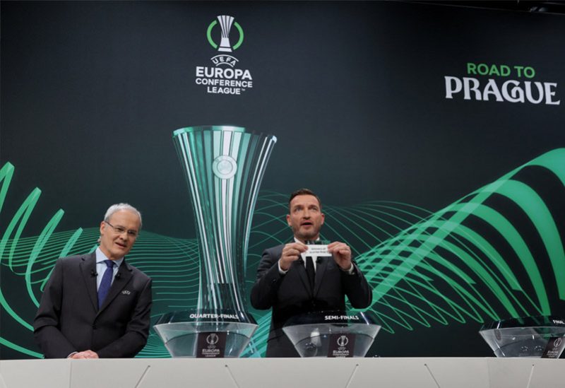فلاديمير سميسر ةجورجيو ماركيتي خلال قرعة دور الثمانية بدوري أبطال أوروبا