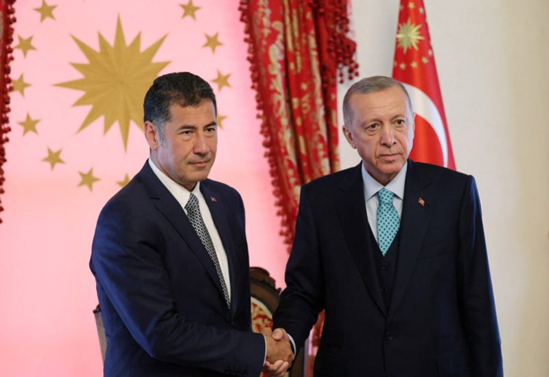 الرئيس التركي رجب طيب أردوغان وسنان أوغان
