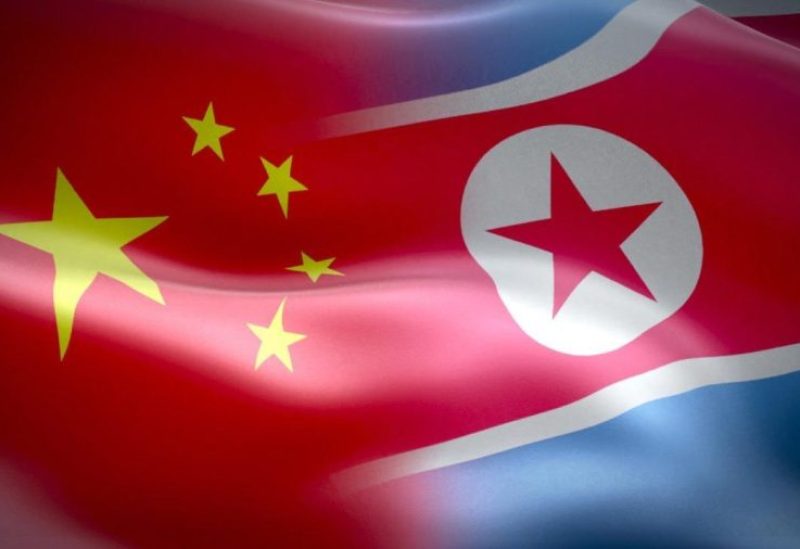 علما كوريا الشمالية والصين