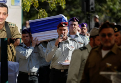 جنازة رمزية لعقيد في الجيش الإسرائيلي قتلته حماس - رويترز