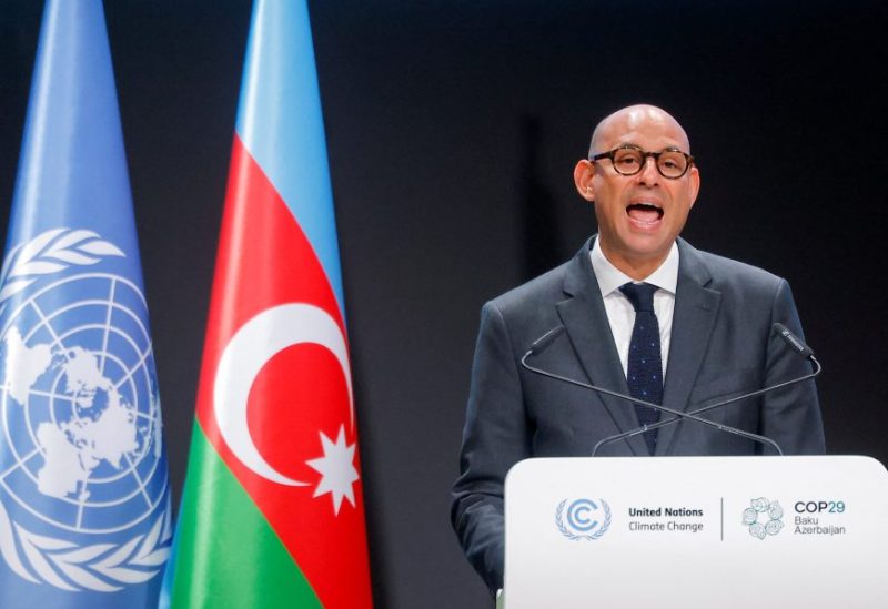 الأمين التنفيذي لاتفاقية الأمم المتحدة الإطارية بشأن تغير المناخ، يلقي بيانًا خلال مؤتمر الأمم المتحدة لتغير المناخ COP29، في باكو، أذربيجان، 12 نوفمبر/تشرين الثاني 2024. رويترز