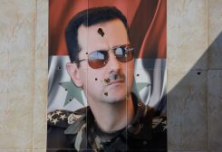 صورة رئيس النظام السوري المخلوع بشار الأسد. رويترز