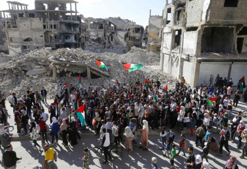 فلسطينيون في مخيم اليرموك بدمشق