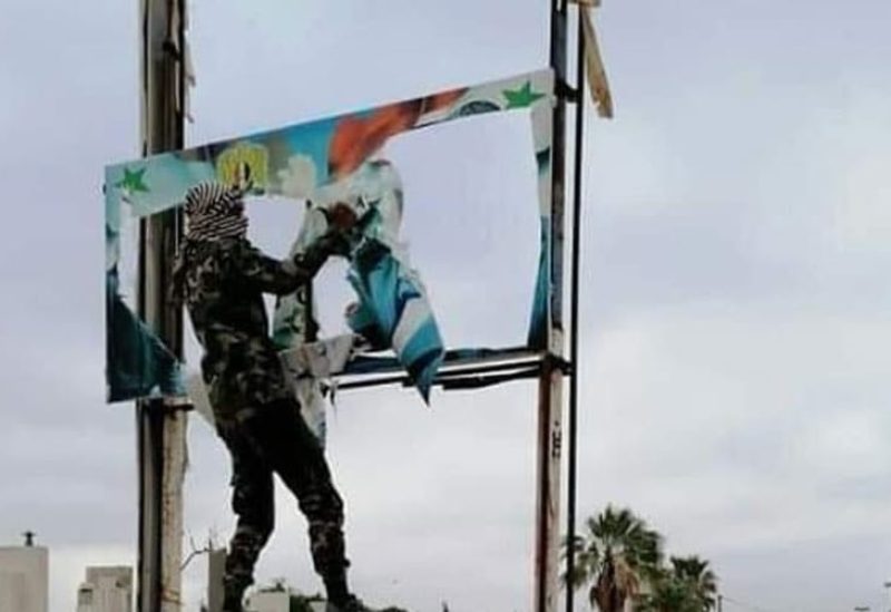 تمزيق صور بشار الأسد