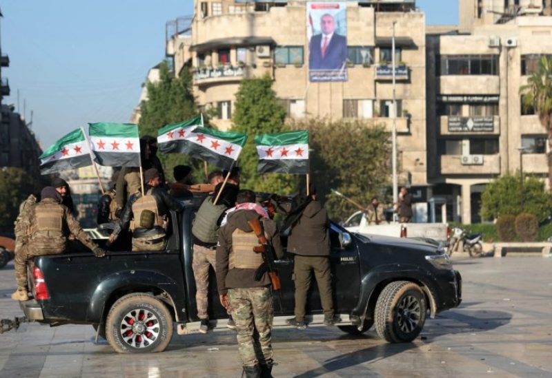 قوات تابعة لفصائل المعارضة السورية في الراشدين، محافظة حلب، سوريا، 29 نوفمبر/تشرين الثاني 2024. رويترز