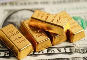 سبائك ذهبية والدولار الأميركي-تعبيرية