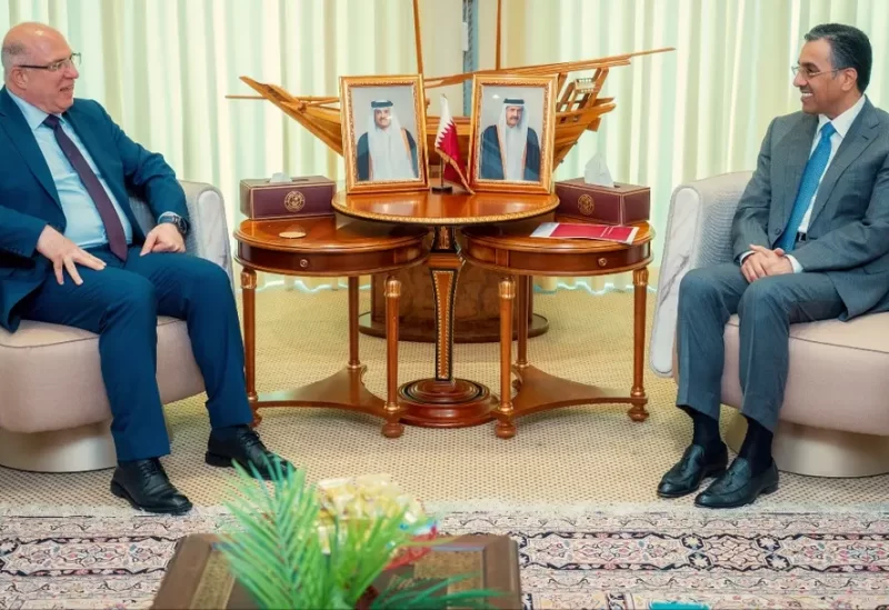 وزير العمل الدكتور محمد حيدر وزير العمل القطري علي بن صميخ المري