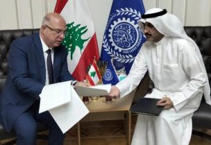 وزير العمل الدكتور محمد حيدر المدير العام لمنظمة العمل العربية، فايز علي المطيري
