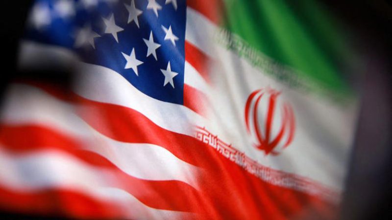 علما أمريكا وإيران في صورة توضيحية التقطت يوم 23 مارس آذار 2026. تصوير: دادو روفيتش - وريترز