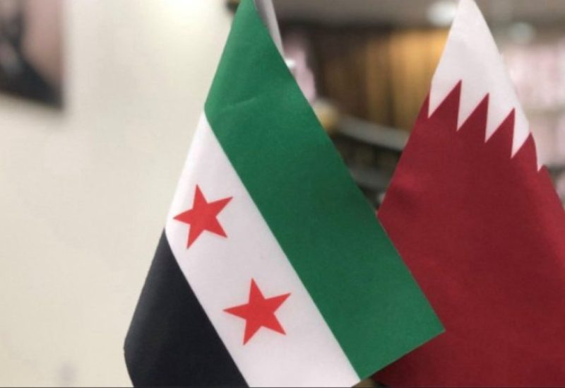 علما قطر وسوريا