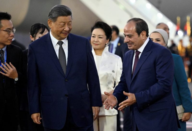 الرئيس المصري عبد الفتاح السيسي مع نظيره الصيني شي جين بينغ
